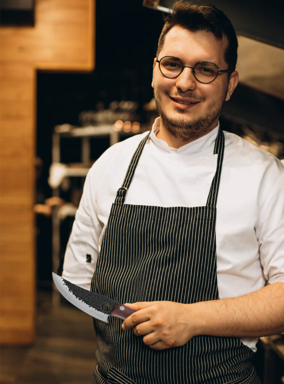 Bernard Descoteaux med Huusk-kniv